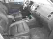 2011 Volkswagen Tiguan S with VIN WVGBV7AXXBW560022, listed as a IAAI auction lot 42693212 with 127,879 mi miles and . Bid and sale history available at DreamBid. Image 5.