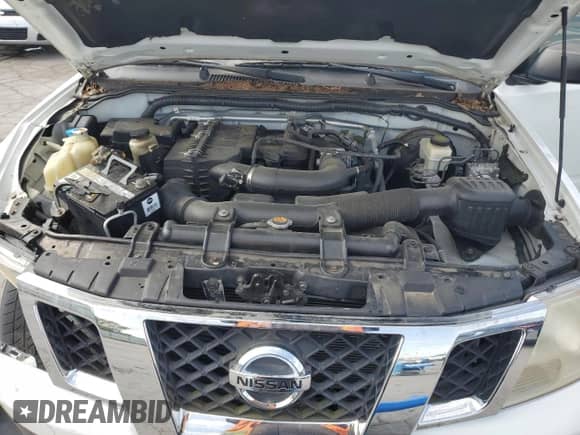 2013 Nissan Frontier S с VIN 1N6BD0CT7DN754344, выставлен на аукционе Copart как лот 71319065 с пробегом 81 050 миль миль и Списание • Salvage title. История ставок и продаж доступна на DreamBid. Изображение 11.