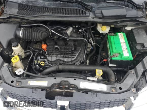 2012 Dodge Grand Caravan Crew with VIN 2C4RDGDGXCR377702, listed as a Copart auction lot 71827965 with 221,594 mi miles and Salvage title. Bid and sale history available at DreamBid. Image 12.