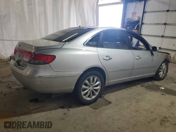 2008 Hyundai Azera Limited с VIN KMHFC46F38A289428, выставлен на аукционе Copart как лот 69294534 с пробегом Не указан миль и Списание • Salvage title. История ставок и продаж доступна на DreamBid. Изображение 3.