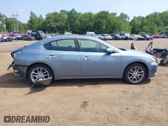 2012 Nissan Maxima SV z VIN 1N4AA5AP8CC842412, wystawiony jako IAAI lot #42798799 z przebiegiem 142 431 mil mil oraz . Historia ofert i sprzedaży dostępna na DreamBid. Obrazek 13.