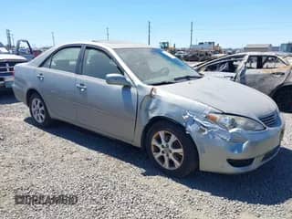 2005 Toyota Camry LE with VIN 4T1BF30K95U619850, listed as a IAAI auction lot 42797111 with 344,775 mi miles and . Bid and sale history available at DreamBid. Image 1.