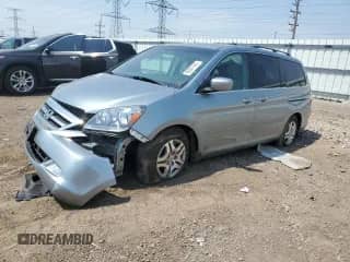 2006 Honda Odyssey Touring with VIN 5FNRL38826B023655, listed as a Copart auction lot 60501425 with 76,615 mi miles and Salvage title. Bid and sale history available at DreamBid. Image 1.