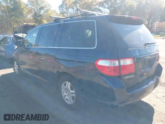 2007 Honda Odyssey EX with VIN 5FNRL38427B127934, listed as a IAAI auction lot 43472923 with 263,495 mi miles and . Bid and sale history available at DreamBid. Image 3.
