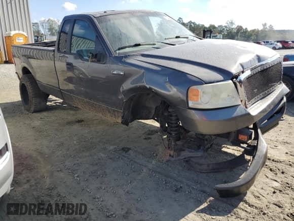 2007 Ford F-150 XL with VIN 1FTRF14V37KC39137, listed as a Copart auction lot 73463164 with 150,331 mi miles and Salvage title. Bid and sale history available at DreamBid. Image 4.