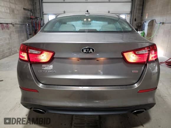 2015 Kia Optima LX с VIN 5XXGM4A79FG467530, выставлен на аукционе Copart как лот 89910375 с пробегом 136 754 миль миль и Списание • Salvage title. История ставок и продаж доступна на DreamBid. Изображение 6.