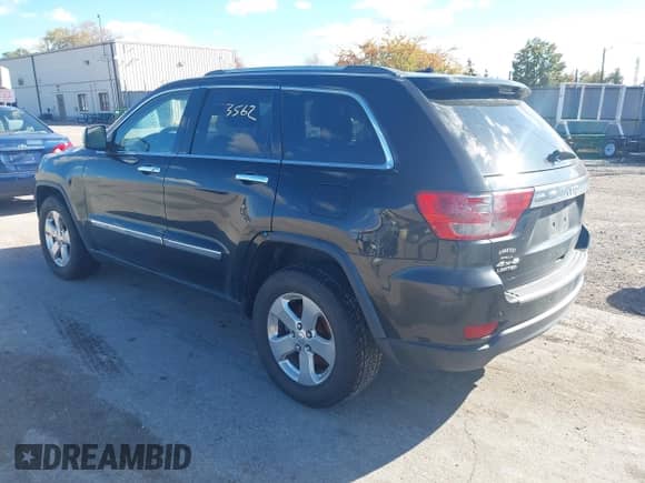 2013 Jeep Grand Cherokee Limited z VIN 1C4RJFBG4DC541915, wystawiony jako IAAI lot #43533562 z przebiegiem 164 436 mil mil oraz . Historia ofert i sprzedaży dostępna na DreamBid. Obrazek 3.