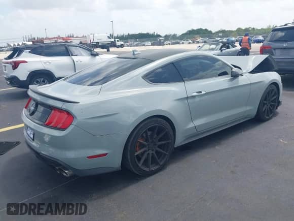 2021 Ford Mustang GT with VIN 1FA6P8CF7M5128125, listed as a IAAI auction lot 42462614 with 31,518 mi miles and . Bid and sale history available at DreamBid. Image 4.