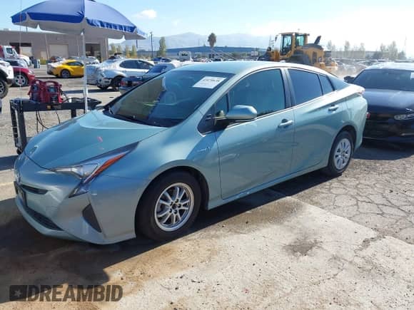 2016 Toyota Prius Two with VIN JTDKBRFU6G3012597, listed as a IAAI auction lot 43470638 with 198,445 mi miles and . Bid and sale history available at DreamBid. Image 2.