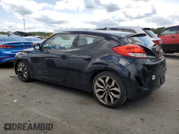 2012 Hyundai Veloster w/Gray Int z VIN KMHTC6AD8CU046631, wystawiony jako Copart lot #68106965 z przebiegiem 120 090 mil mil oraz Szkoda całkowita • Salvage title. Historia ofert i sprzedaży dostępna na DreamBid. Obrazek 2.