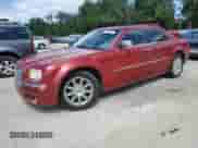 2009 Chrysler 300 C Hemi с VIN 2C3KA63T49H551933, выставлен на аукционе Copart как лот 52088905 с пробегом 185 829 миль миль и Чистый • Clean title. История ставок и продаж доступна на DreamBid. Изображение 1.