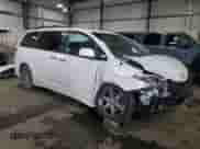 2014 Toyota Sienna SE with VIN 5TDXK3DC2ES442961, listed as a Copart auction lot 70143165 with 204,488 mi miles and Non repairable. Bid and sale history available at DreamBid. Image 4.