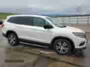 2016 Honda Pilot EX-L z VIN 5FNYF6H78GB084702, wystawiony jako Copart lot #56064915 z przebiegiem 240 374 mil mil oraz Szkoda całkowita • Salvage title. Historia ofert i sprzedaży dostępna na DreamBid. Obrazek 4.