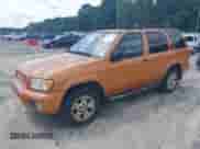 2001 Nissan Pathfinder SE z VIN JN8DR07Y71W506432, wystawiony jako IAAI lot #42459734 z przebiegiem 209 997 mil mil oraz . Historia ofert i sprzedaży dostępna na DreamBid. Obrazek 2.