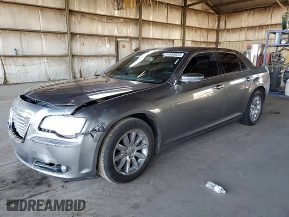 2012 Chrysler 300 Limited с VIN 2C3CCACGXCH309692, выставлен на аукционе Copart как лот 41650025 с пробегом 186 125 миль миль и Списание • Salvage title. История ставок и продаж доступна на DreamBid. Изображение 1.