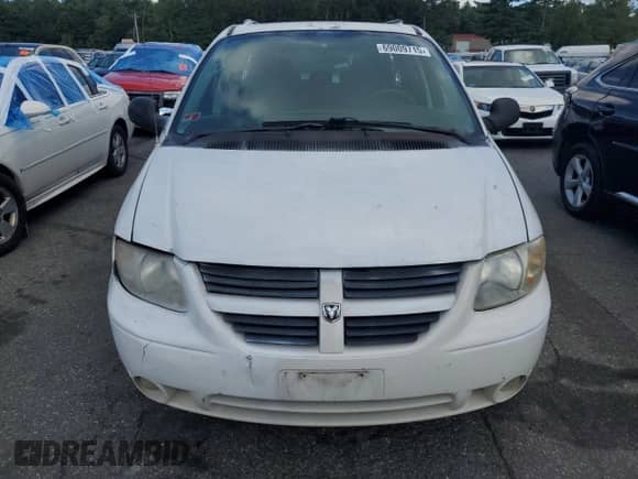 2005 Dodge Caravan SXT с VIN 2D4GP44L65R448359, выставлен на аукционе Copart как лот 69009715 с пробегом 157 079 миль миль и Списание • Salvage title. История ставок и продаж доступна на DreamBid. Изображение 5.
