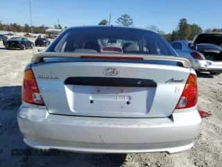 2003 Hyundai Accent с VIN KMHCF35C73U273610, выставлен на аукционе Copart как лот 85868294 с пробегом 168 203 миль миль и Списание • Salvage title. История ставок и продаж доступна на DreamBid. Изображение 6.