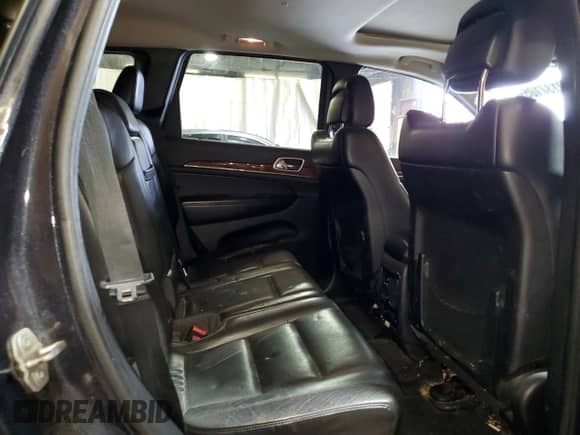 2012 Jeep Grand Cherokee Limited z VIN 1C4RJFBT4CC264632, wystawiony jako Copart lot #90137105 z przebiegiem 214 018 mil mil oraz Czysty tytuł • Clean title. Historia ofert i sprzedaży dostępna na DreamBid. Obrazek 11.