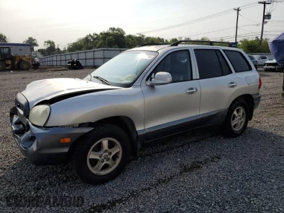 2003 Hyundai Santa Fe GLS с VIN KM8SC73DX3U391108, выставлен на аукционе Copart как лот 60356315 с пробегом 167 577 миль миль и Списание • Salvage title. История ставок и продаж доступна на DreamBid. Изображение 1.