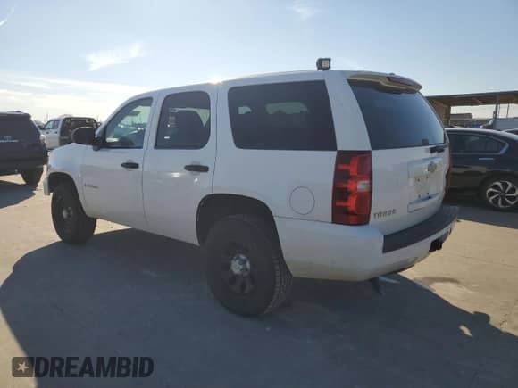 2009 Chevrolet Tahoe Commercial z VIN 1GNFK13049R255580, wystawiony jako Copart lot #88097375 z przebiegiem 199 862 mil mil oraz Szkoda całkowita • Salvage title. Historia ofert i sprzedaży dostępna na DreamBid. Obrazek 2.