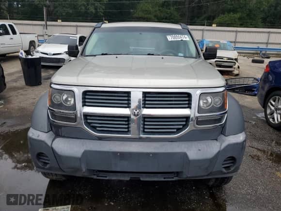 2008 Dodge Nitro SXT z VIN 1D8GU28K48W185510, wystawiony jako Copart lot #70859474 z przebiegiem 195 355 mil mil oraz Szkoda całkowita • Salvage title. Historia ofert i sprzedaży dostępna na DreamBid. Obrazek 5.