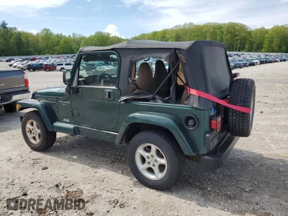 2001 Jeep Wrangler Sahara z VIN 1J4FA59S21P349009, wystawiony jako Copart lot #57588205 z przebiegiem 235 268 mil mil oraz Czysty tytuł • Clean title. Historia ofert i sprzedaży dostępna na DreamBid. Obrazek 2.