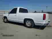 1989 GMC Sierra 1500 z VIN 1GTDC14K7KZ505798, wystawiony jako Copart lot #54166215 z przebiegiem 158 125 mil mil oraz Szkoda całkowita • Salvage title. Historia ofert i sprzedaży dostępna na DreamBid. Obrazek 2.