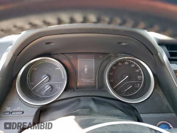 2019 Toyota Camry Hybrid LE с VIN 4T1B21HK5KU515906, выставлен на аукционе Copart как лот 70847535 с пробегом 172 967 миль миль и Списание • Salvage title. История ставок и продаж доступна на DreamBid. Изображение 9.