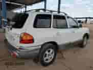 2002 Hyundai Santa Fe GLS с VIN KM8SC73D72U177661, выставлен на аукционе Copart как лот 65093685 с пробегом 16 895 миль миль и Списание • Salvage title. История ставок и продаж доступна на DreamBid. Изображение 3.