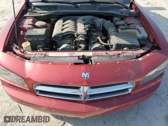 2010 Dodge Charger SXT z VIN 2B3CA3CVXAH107896, wystawiony jako Copart lot #68970235 z przebiegiem 197 785 mil mil oraz Szkoda całkowita • Salvage title. Historia ofert i sprzedaży dostępna na DreamBid. Obrazek 11.