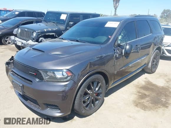 2018 Dodge Durango GT with VIN 1C4RDHDG7JC494195, listed as a IAAI auction lot 43097393 with 63,884 mi miles and . Bid and sale history available at DreamBid. Image 17.