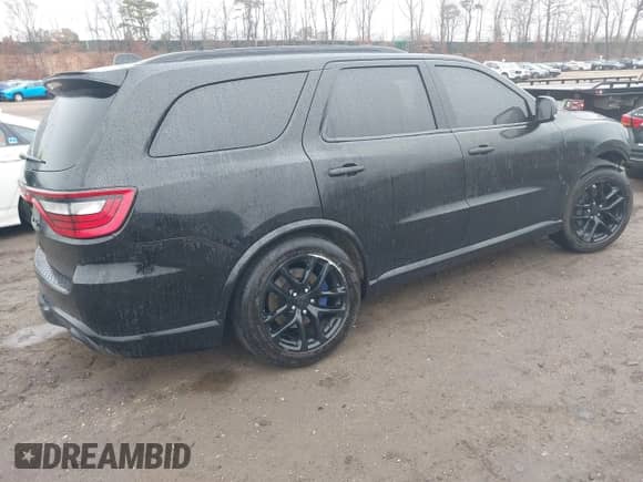2021 Dodge Durango SRT 392 with VIN 1C4SDJGJ1MC547347, listed as a IAAI auction lot 41671634 with 51,506 mi miles and . Bid and sale history available at DreamBid. Image 4.