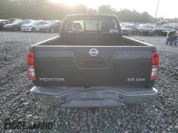 2010 Nissan Frontier SE z VIN 1N6AD0CW9AC433256, wystawiony jako Copart lot #64661135 z przebiegiem 132 223 mil mil oraz Szkoda całkowita • Salvage title. Historia ofert i sprzedaży dostępna na DreamBid. Obrazek 6.