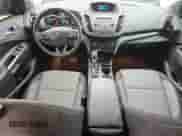 2018 Ford Escape SE with VIN 1FMCU9GD2JUB39549, listed as a Copart auction lot 84175385 with 127,811 mi miles and Salvage title. Bid and sale history available at DreamBid. Image 8.