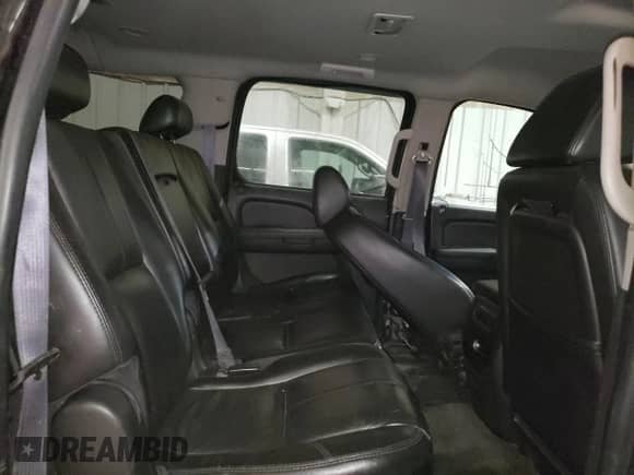 2013 Chevrolet Suburban с VIN 1GNWK5EG4DR246825, выставлен на аукционе Copart как лот 56764205 с пробегом 162 459 миль миль и Списание • Salvage title. История ставок и продаж доступна на DreamBid. Изображение 11.