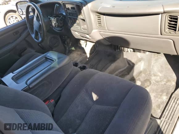 2006 Chevrolet Silverado 1500 LS z VIN 1GCEC19X16Z267767, wystawiony jako Copart lot #77700684 z przebiegiem Nie podano mil oraz Szkoda całkowita • Salvage title. Historia ofert i sprzedaży dostępna na DreamBid. Obrazek 8.
