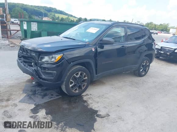 2018 Jeep Compass Trailhawk z VIN 3C4NJDDB1JT451464, wystawiony jako IAAI lot #42674943 z przebiegiem 114 704 mil mil oraz . Historia ofert i sprzedaży dostępna na DreamBid. Obrazek 17.