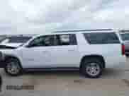 2017 Chevrolet Suburban LT with VIN 1GNSCHKC7HR115215, listed as a IAAI auction lot 42140471 with 153,705 mi miles and . Bid and sale history available at DreamBid. Image 14.