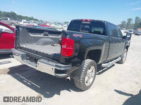 2016 Chevrolet Silverado 2500HD LT z VIN 1GC1KVEG9GF296399, wystawiony jako IAAI lot #42742189 z przebiegiem 127 470 mil mil oraz . Historia ofert i sprzedaży dostępna na DreamBid. Obrazek 4.
