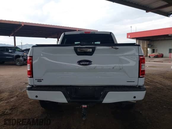 2018 Ford F-150 XL z VIN 1FTEW1EPXJKE24016, wystawiony jako IAAI lot #43383786 z przebiegiem 56 837 mil mil oraz . Historia ofert i sprzedaży dostępna na DreamBid. Obrazek 16.