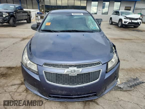 2014 Chevrolet Cruze LS с VIN 1G1PB5SH1E7279250, выставлен на аукционе Copart как лот 68372345 с пробегом 136 411 миль миль и Списание • Salvage title. История ставок и продаж доступна на DreamBid. Изображение 5.