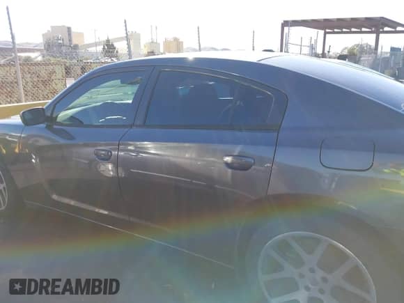 2014 Dodge Charger SE z VIN 2C3CDXBG0EH221576, wystawiony jako IAAI lot #43560592 z przebiegiem 165 509 mil mil oraz . Historia ofert i sprzedaży dostępna na DreamBid. Obrazek 14.