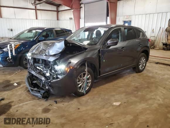 2023 Mazda CX-5 S Preferred z VIN JM3KFBCMXP0285762, wystawiony jako Copart lot #67717775 z przebiegiem 47 276 mil mil oraz Nie do naprawy • Non repairable. Historia ofert i sprzedaży dostępna na DreamBid. Obrazek 1.