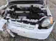 2004 Hyundai Accent GL z VIN KMHCG35C94U310459, wystawiony jako Copart lot #79477194 z przebiegiem 86 942 mil mil oraz Szkoda całkowita • Salvage title. Historia ofert i sprzedaży dostępna na DreamBid. Obrazek 11.