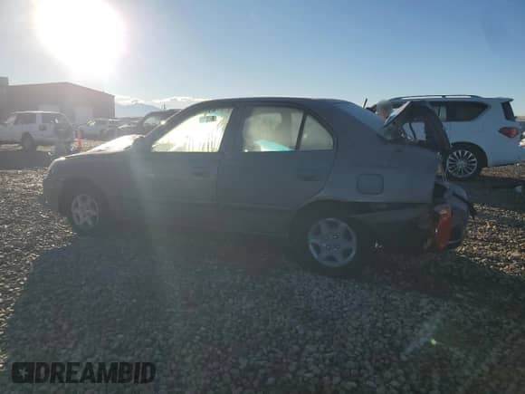 2005 Hyundai Accent GLS с VIN KMHCG45C95U592609, выставлен на аукционе Copart как лот 79048224 с пробегом 138 738 миль миль и Списание • Salvage title. История ставок и продаж доступна на DreamBid. Изображение 2.