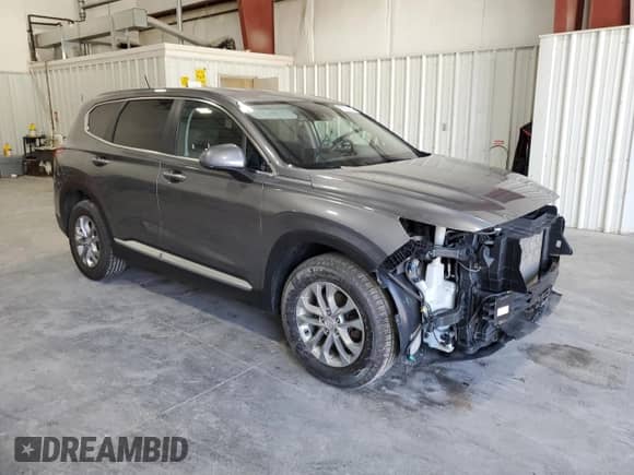 2019 Hyundai Santa Fe SE with VIN 5NMS2CAD7KH095410, listed as a Copart auction lot 86133115 with 98,866 mi miles and Salvage title. Bid and sale history available at DreamBid. Image 4.