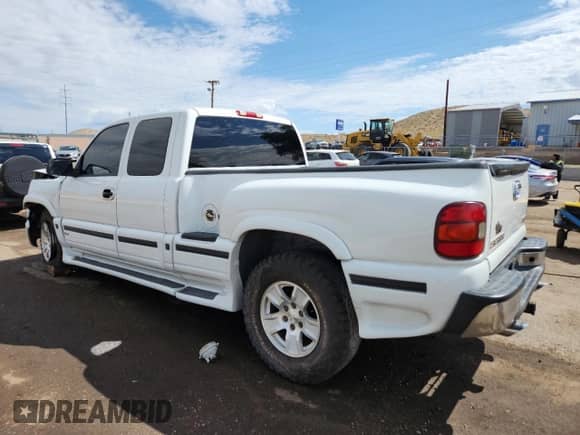 2003 GMC Sierra 1500 SLT with VIN 1GTEK19T03Z289870, listed as a Copart auction lot 71614465 with 214,694 mi miles and Salvage title. Bid and sale history available at DreamBid. Image 2.
