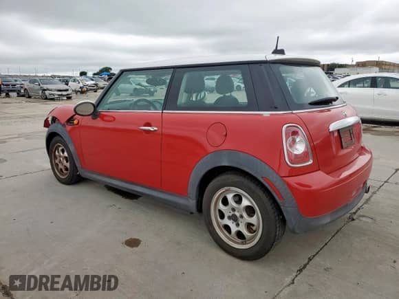 2012 MINI Hardtop with VIN WMWSU3C56CT261218, listed as a Copart auction lot 60810455 with 60,770 mi miles and Salvage title. Bid and sale history available at DreamBid. Image 2.