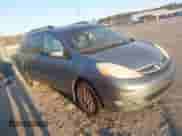 2007 Toyota Sienna XLE z VIN 5TDZK22C47S048516, wystawiony jako IAAI lot #41367115 z przebiegiem 236 058 mil mil oraz . Historia ofert i sprzedaży dostępna na DreamBid. Obrazek 1.