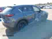 2025 Mazda CX-5 S Carbon Edition z VIN JM3KFBCM0S0575730, wystawiony jako IAAI lot #42685414 z przebiegiem Nie podano mil oraz . Historia ofert i sprzedaży dostępna na DreamBid. Obrazek 4.